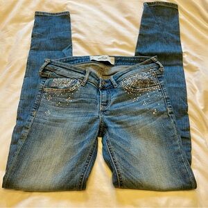 Hollister Blue Skinny Jeans with Rhinestone Embellishments